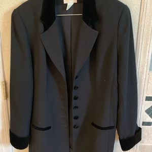Black tuxedo jacket with velvet cuffs. and lapel